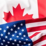 Canadian and American flags