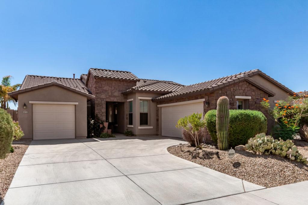 home with  triple garage in Estrella t Goodyear, Arizona