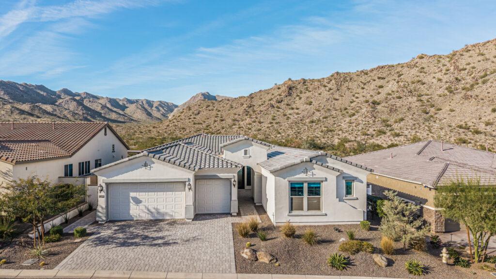 Home in Verrado at Buckeye Arizona that backs to the white Tank Mountains